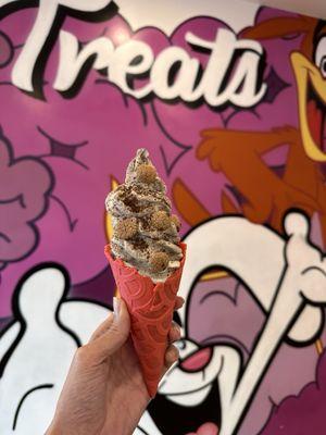 Cookie ice cream in a red velvet cone