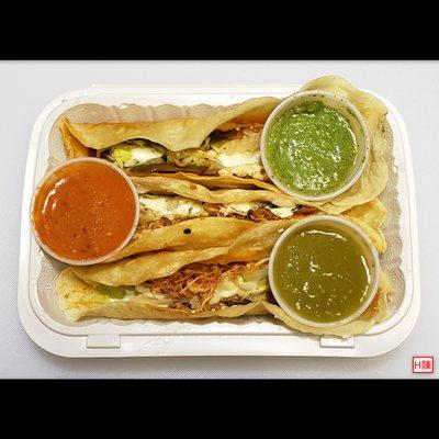 Three quesadillas for $3 each; 2 tinga (braised/shredded meat) & 1  carne con rajas (beef & roasted peppers)...