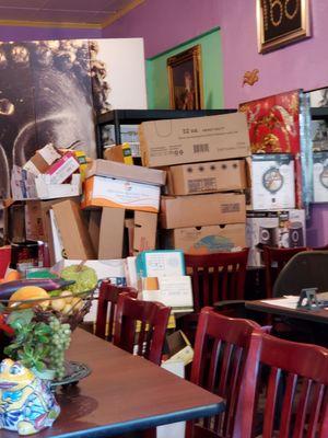 Piles of empty boxes fill up a big part of the dining room.