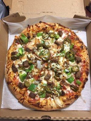 Beef, onions, green peppers and jalapeños. Tasty Pizza!