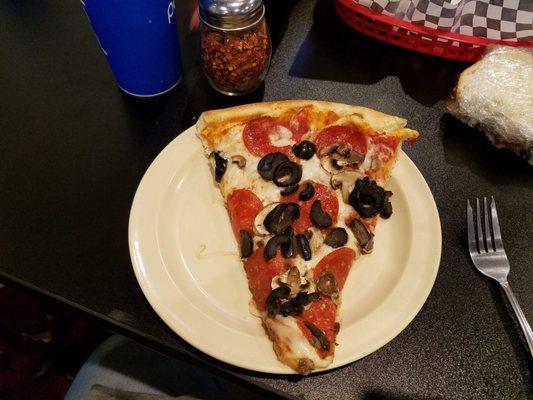 Pepperoni, mushrooms, and olives pizza.