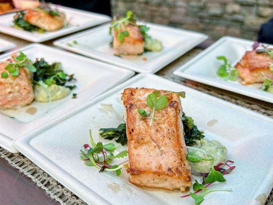 Fare Island lemon salmon fillet with braised smoked collard greens and charred scallion aioli