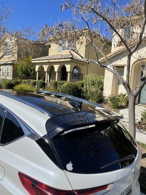 Gloss black vinyl wrap on roof and spoiler