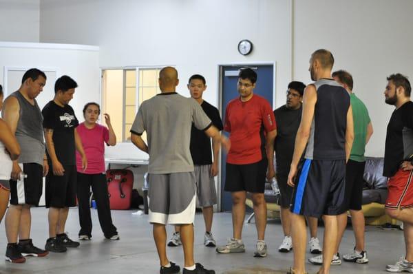 Onramp crew getting a post workout review.