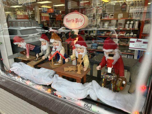 Lutz has craftsman holiday window displays