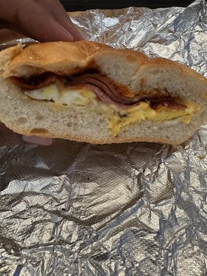 Taylor ham egg and cheese on a round roll