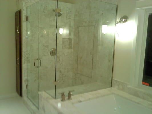 Custom shower enclosure by Glass Works.