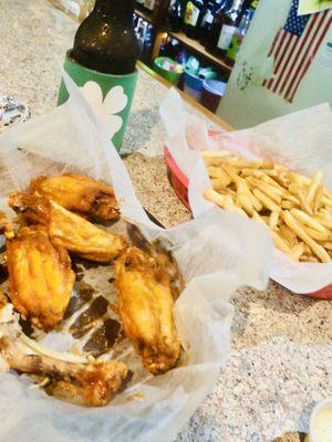 Crispy juicy tender hot wings with awesome shoe string fries!