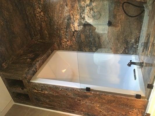 New Bathtub and Wall Surround with glass panel