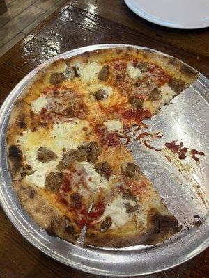 Quattro Formaggi Pizza.   Sausage and sweet pepper pizza.