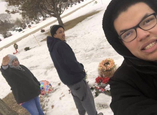 Me and my older brother And my mother Visiting her gravesite