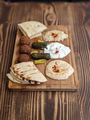 10/23/21 - Appetizer Combo Plate $14.95. Hummus, dolma x2, baba ganoush, falafel  x3, tzatziki. GOOD.