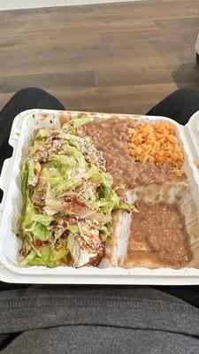 Tamale with Beans, lettuce, and Spanish rice. Apparently it is the special today.