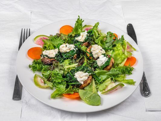 Silver Dollar
Stuffed Mushrooms with Spinach and Goat Cheese on a bed of lettuce