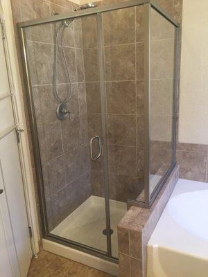 New shower!  No need for a new bath mat whatsoever!  Not ALL showers leak.