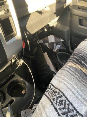 Glove box laying in floorboard