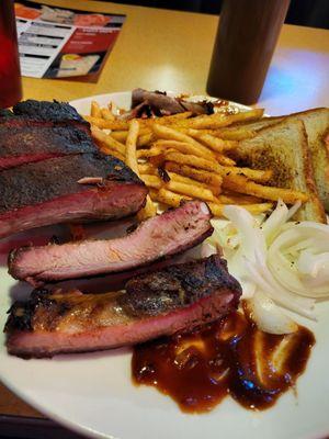 Half rack of ribs with fries