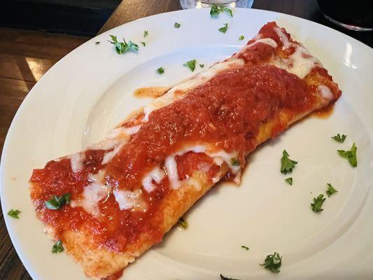 Manicotti made with a crêpe, appetizer portion.