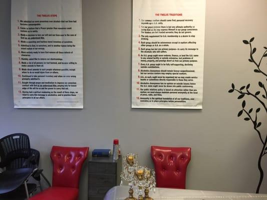 AA Meeting area with the 12 Steps and 12 Traditions on the wall