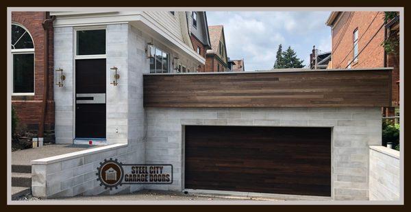 Wooden insulated garage door