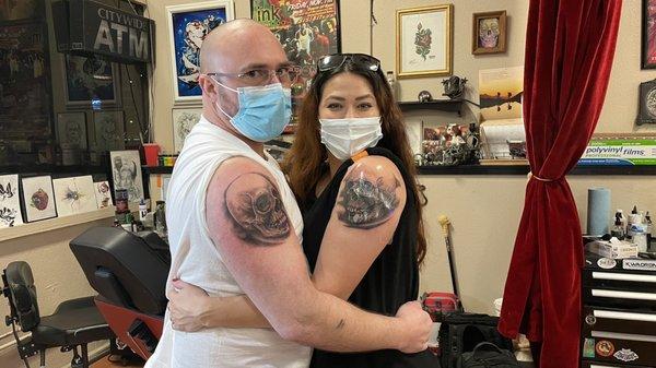 Couples matching skulls. Crab on the left and Reign on the right.