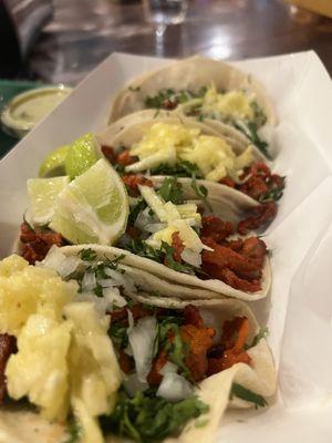 Al Pastor tacos with pineapple