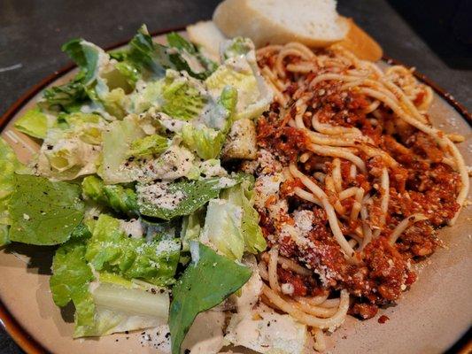 My half portion of spaghetti and Cesar salad. Split it with my husband. $17 for the bologenes spaghetti and $12 for some romaine lettuce.