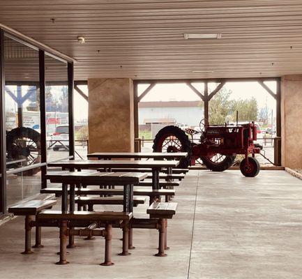 Outdoor dining with farm equipment