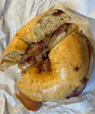 BREAKFAST BAGEL (bacon and eggs) on a toasted sun-dried tomato bagel