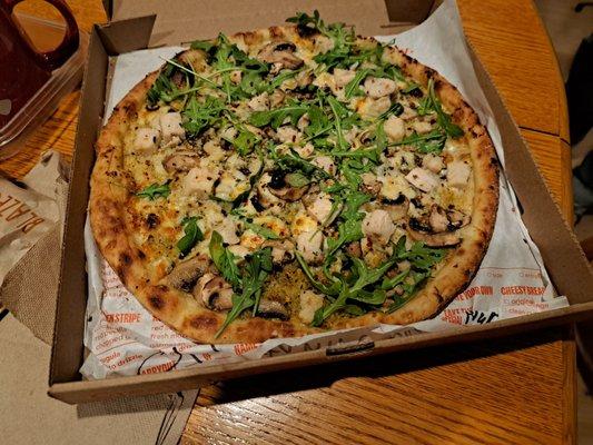 Pesto, chicken, mushrooms, and arugula pizza for Pi Day 2023