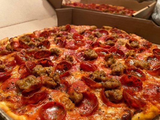 Pepperoni and light Italian sausage pizza.