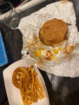 "Spartan burger and side of onion rings"