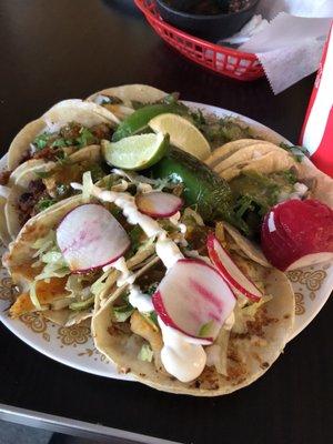 8 tacos (pescado, lengua, and al pastor) I saved two for the next morning and they were just as delicious and surprisingly still sturdy.