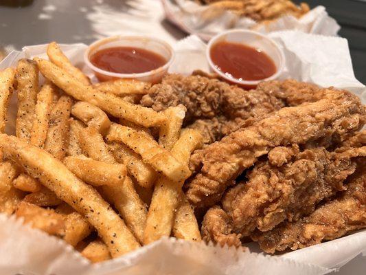 Chicken tenders with lemon pepper and fries