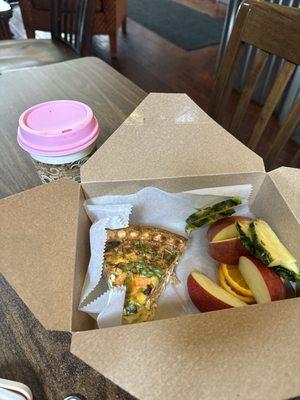 Spinach, mushroom, onion, tomato, green pepper and Gouda cheese quiche, fresh fruit and carmel macchiato coffee.