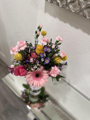 Pink, purple, yellow floral arrangement. Lots of pretty colors from Royal Blooms, CA 95747