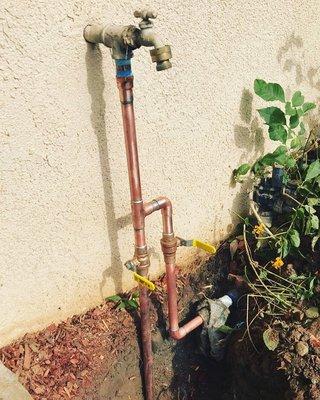 New water service riser installation with two isolation valves 1 to the home and 1 to the irrigation