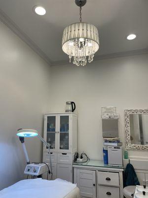 Lovely treatment rooms. Cute chandeliers.