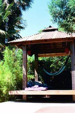 Green Alchemy designed this spa oasis complete with hot tub and resting platform.