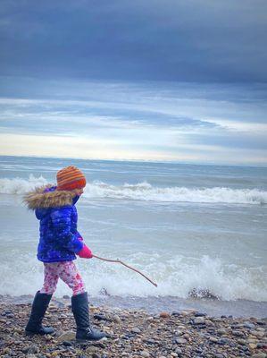 My niece having fun by the lake.