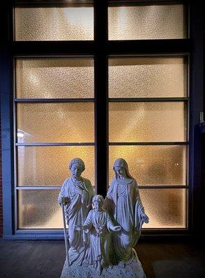 The Holy Family of Jesus, Mary & Joseph greet the students of UNR walking by at day or night...