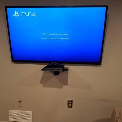 Custom install with wires completely hidden with a floating shelf for ps4