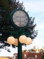 Customized clock in front of bar.