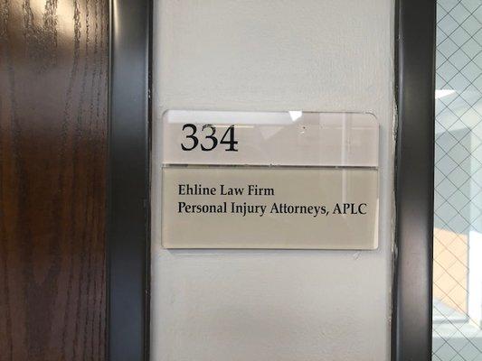 Front door of public facing office at Ehline Law Firm in Torrance, CA.