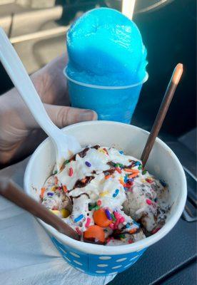 Blueberry water ice and a brown rolled ice cream with sprinkles and Reeces pieces