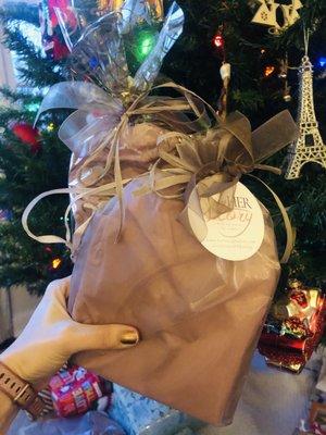 Her Story boutique does a beautiful job with complimentary gift bags!  Necklaces, bracelets, a Buddha board, lavender heated face mask!