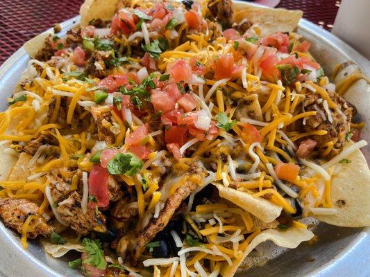 Blackened Chicken Nachos minus peppers and onions