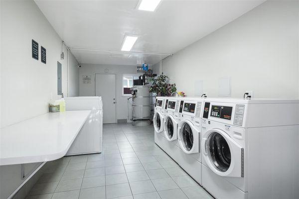 All new Speed Queen Washers and Dryers.  No need for coins.