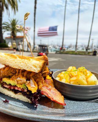 Lobster BLT paired Pan-Fried Potatoes topped with Sriracha Aioli