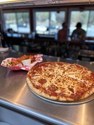 Traditional wings and Pepperoni pizza